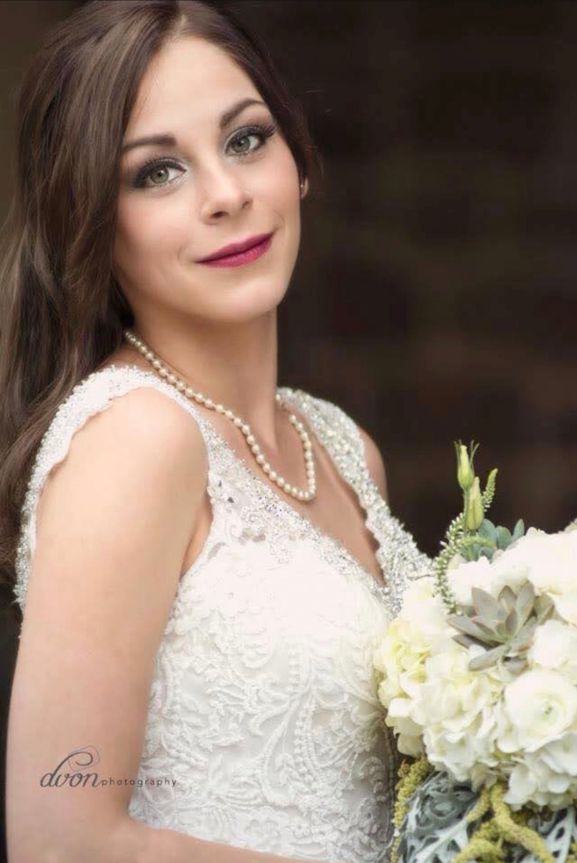 Bride or wedding party member wearing professional bridal makeup by Evolved Beauty