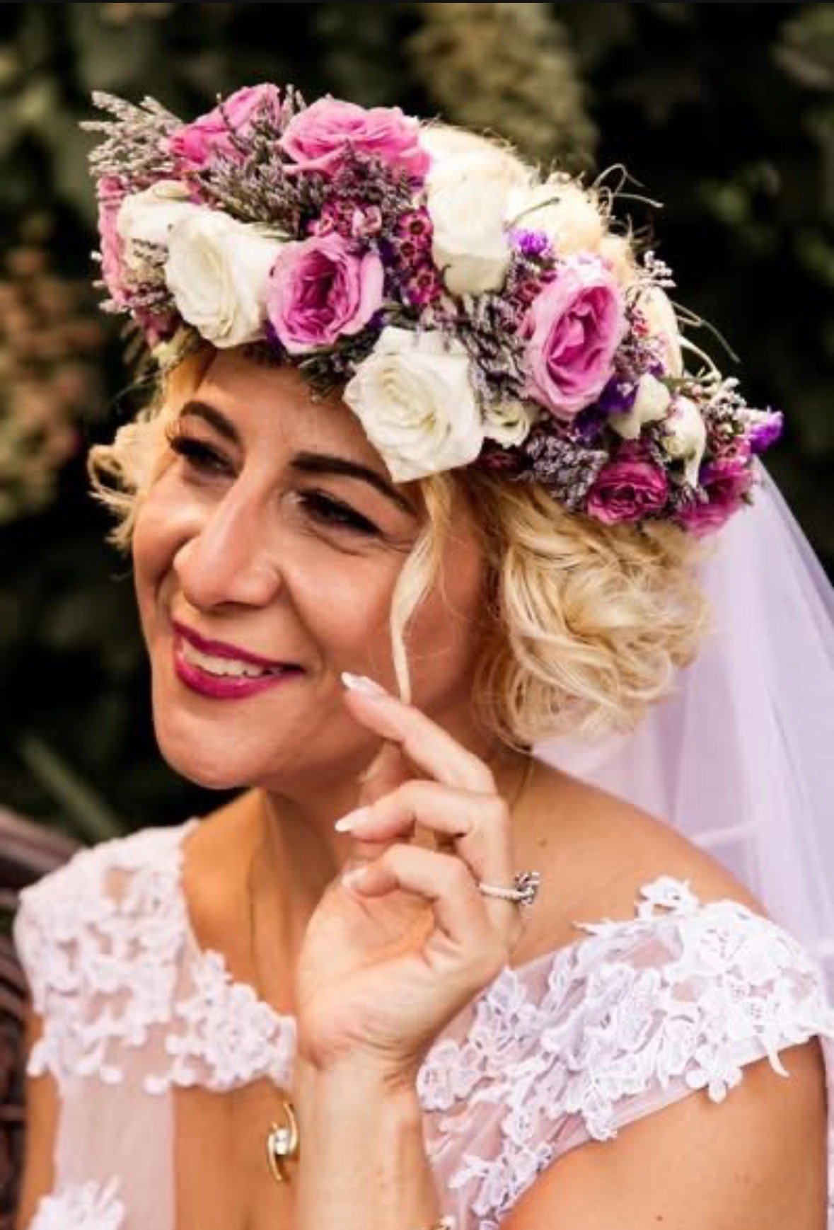 Bride or wedding party member wearing professional bridal makeup by Evolved Beauty
