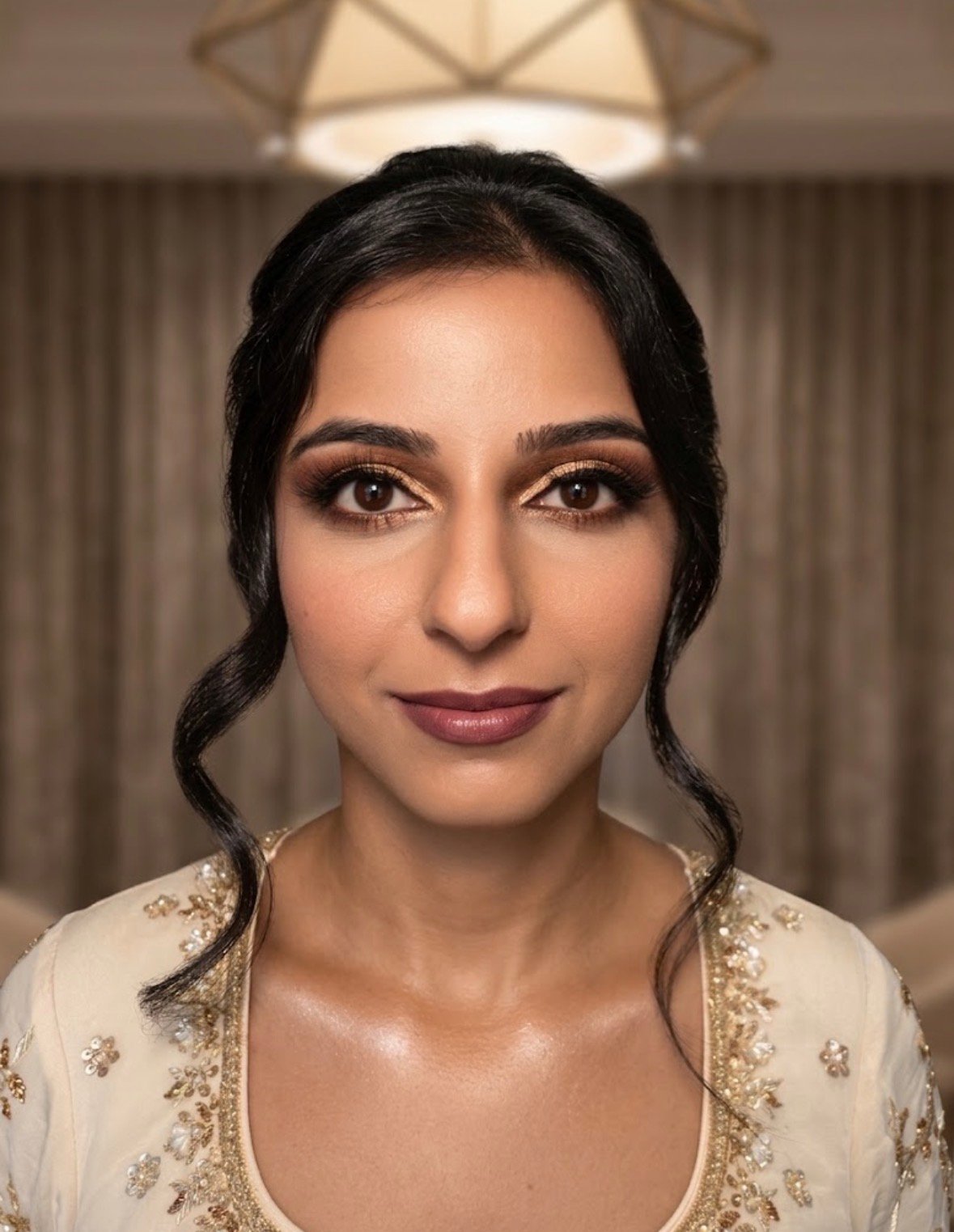 Bride or wedding party member wearing professional bridal makeup by Evolved Beauty